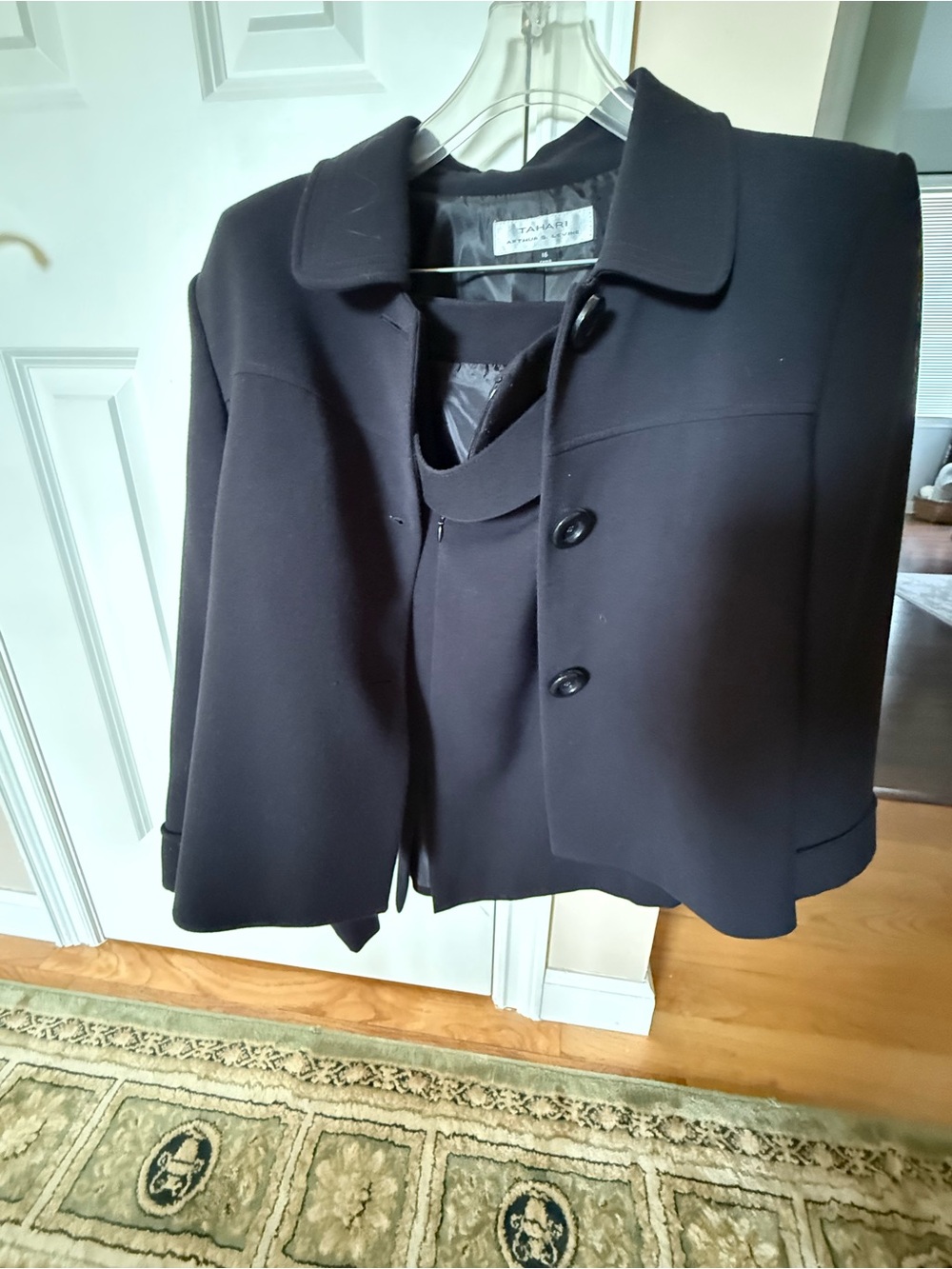 Tahari Black Women's Button Front Jacket and skirt set.
